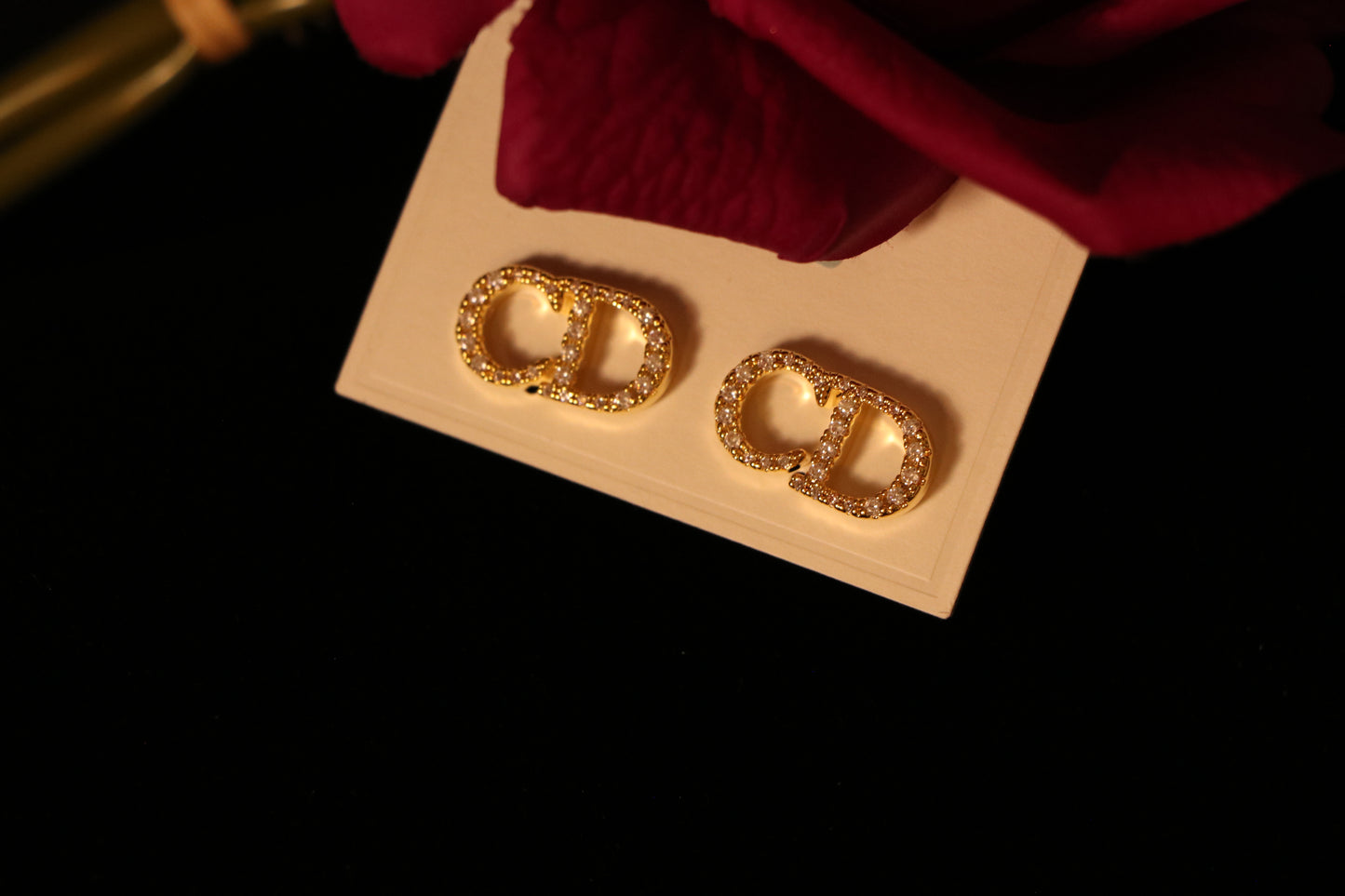 CD Stud Earrings Studded with full Zircon
