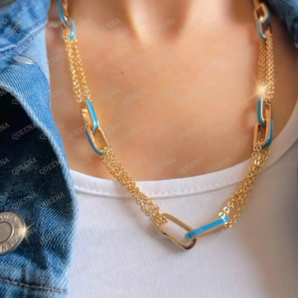 Double Interlocking Paper Clip Link Chain Necklace In Yellow Gold With A Blue Turquoise Touch