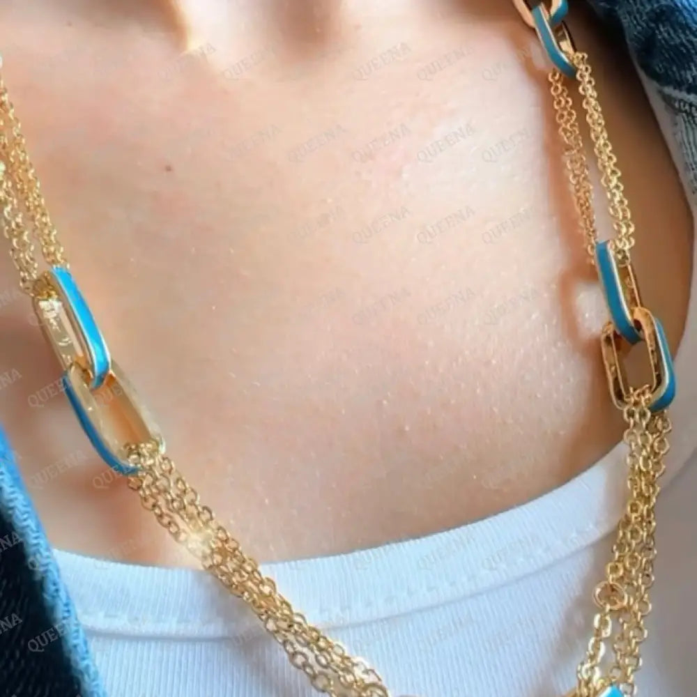 Double Interlocking Paper Clip Link Chain Necklace In Yellow Gold With A Blue Turquoise Touch