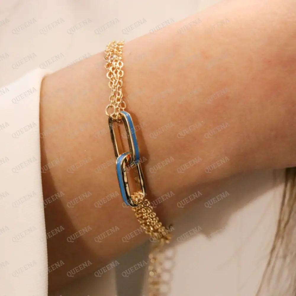 Double Interlocking Paperclip Link Chain Bracelet In Yellow Gold With A Blue Turquoise Touch