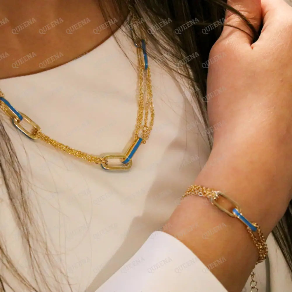 Double Interlocking Paperclip Link Chain Bracelet In Yellow Gold With A Blue Turquoise Touch