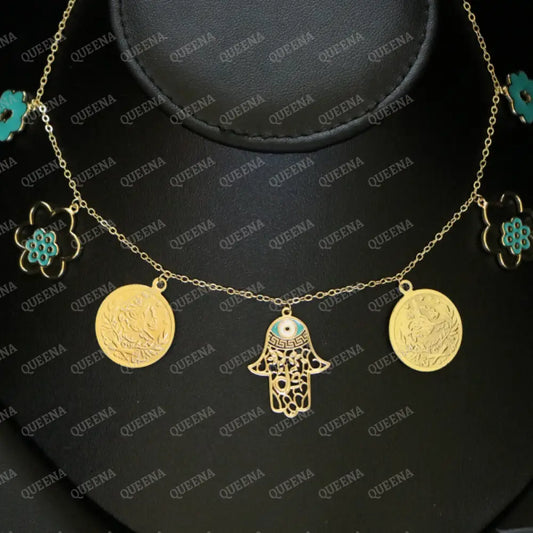 Golden and Turquoise Charms Necklace with coins and a hamsa hand pendants Necklaces