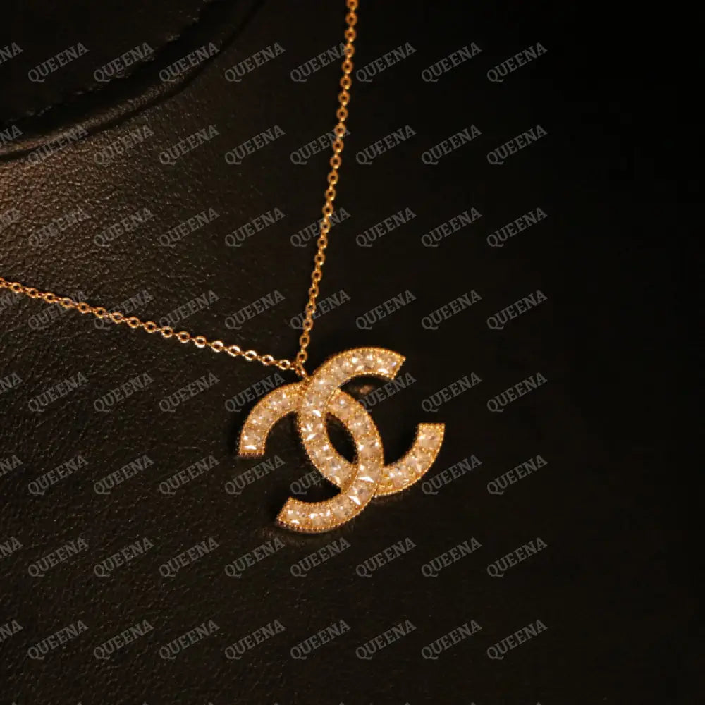 Golden CH Pendant Necklace Studded with Zircons Necklaces