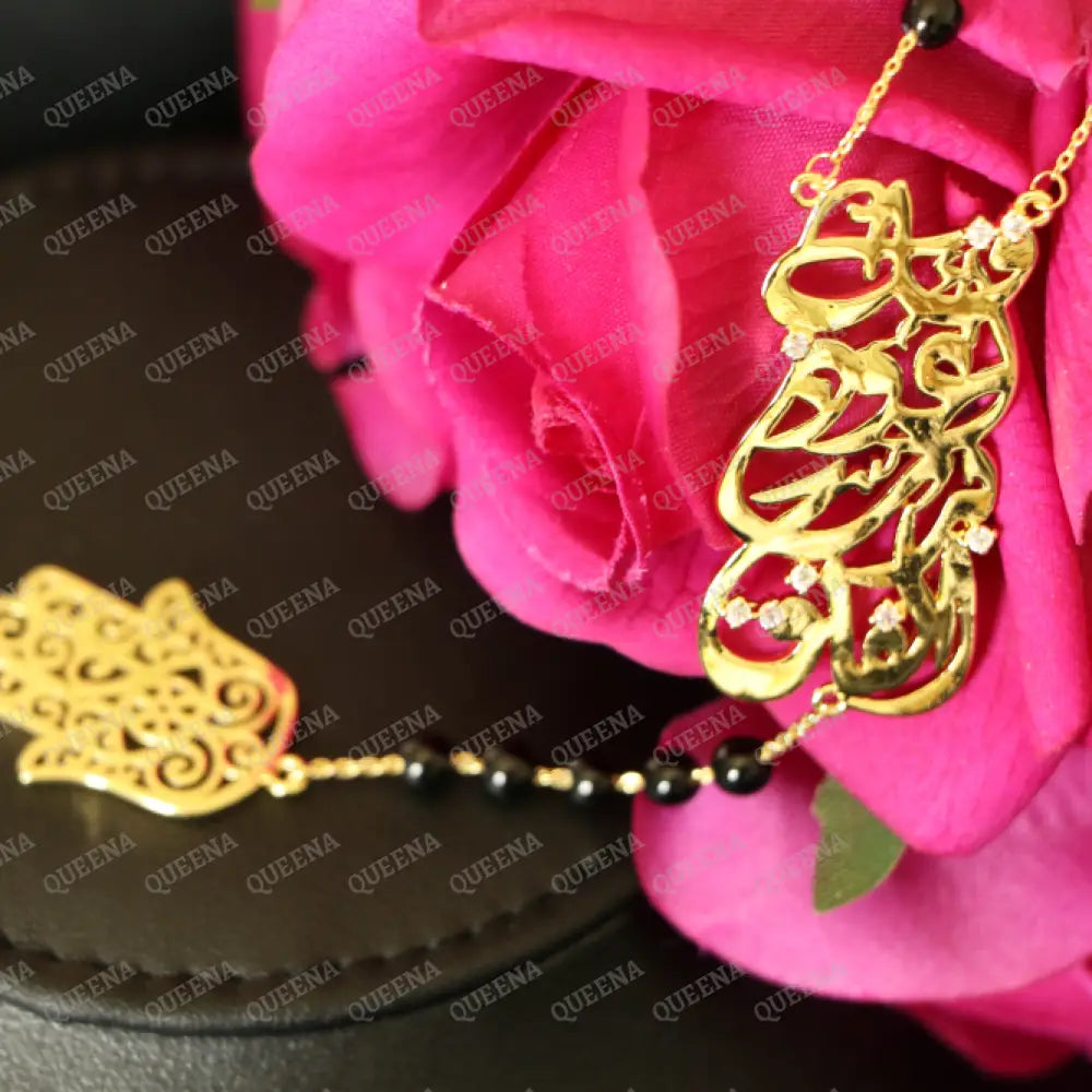 Luxurious ’Qul a3oz bi rab Al Falaq’ In Arabic Calligraphy with Black beads ROSARY necklace With Hamsa Hand Charm