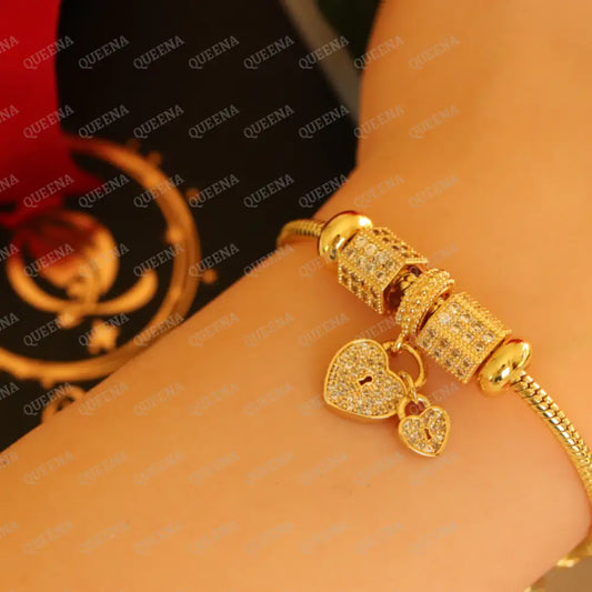 Luxury Golden Heart Charms Bracelet Studded With Zircon Stones