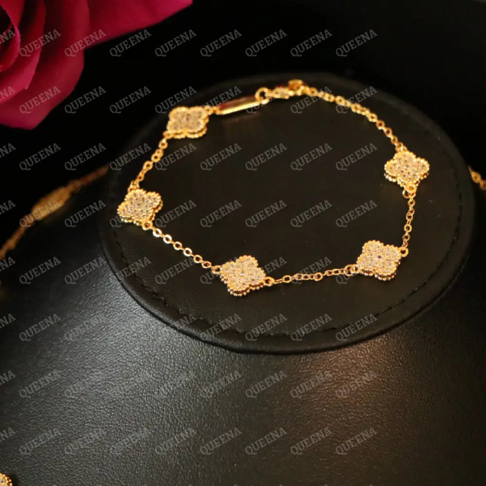 Luxury Golden ROSA Floral Jewelry Set with 10 Mini Clover Flowers (Necklace + Bracelet) Studded with Full Zircon