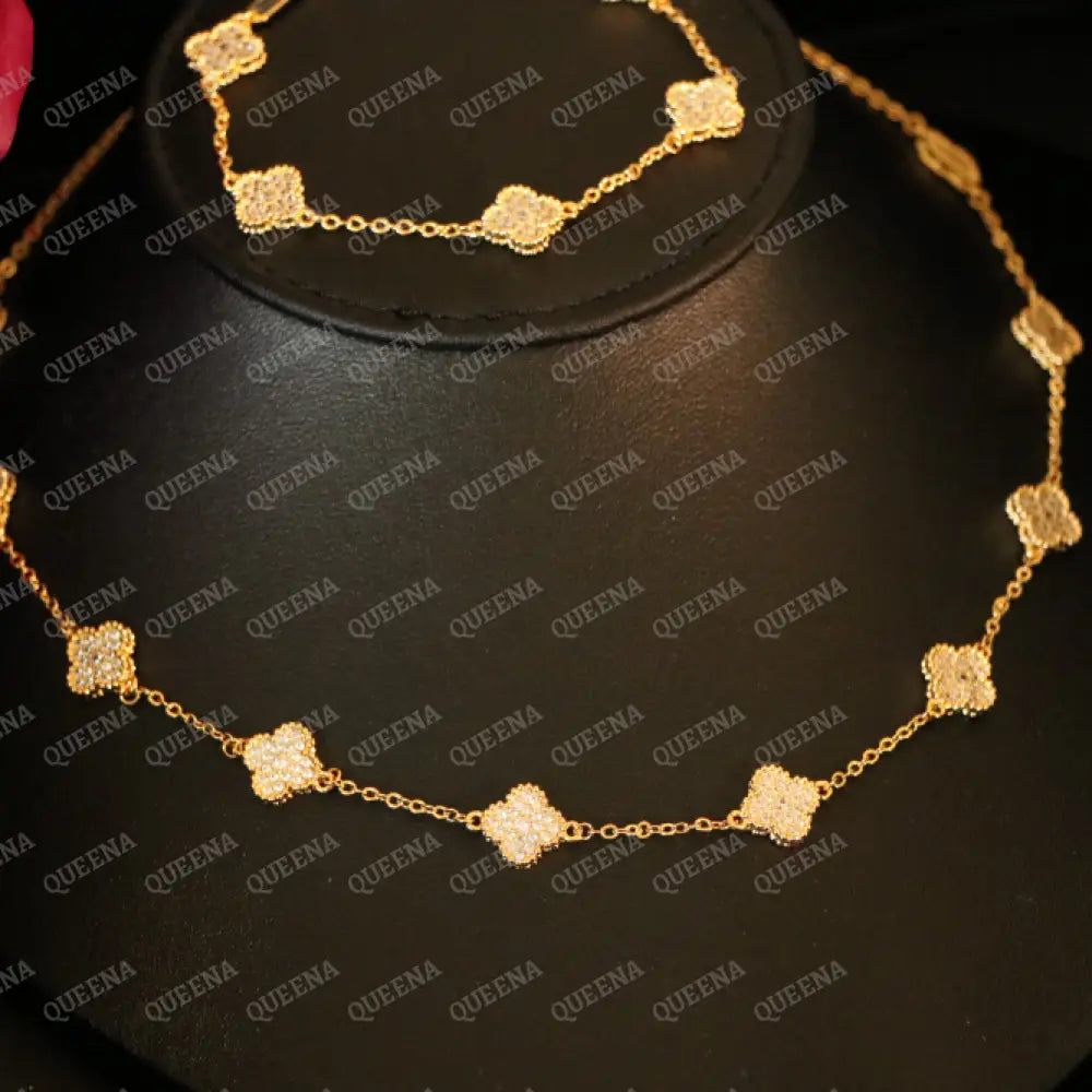 Luxury Golden ROSA Floral Jewelry Set with 10 Mini Clover Flowers (Necklace + Bracelet) Studded with Full Zircon