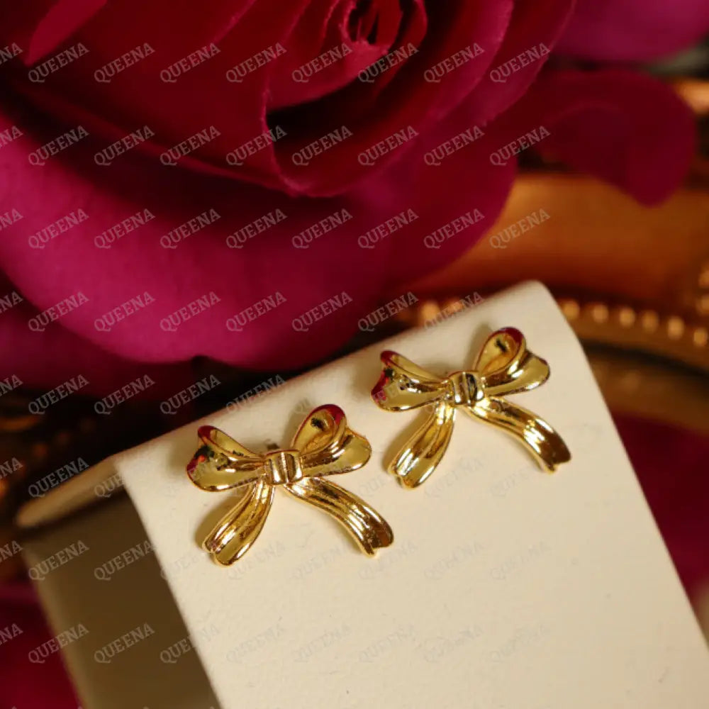 Tiny Bow Stud Earrings earrings