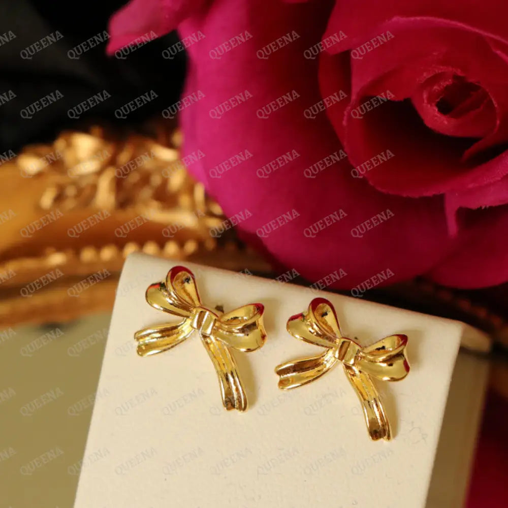 Tiny Bow Stud Earrings earrings
