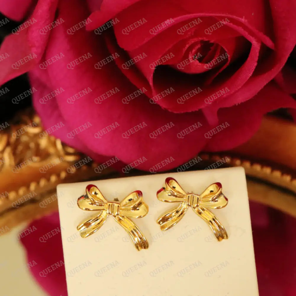 Tiny Bow Stud Earrings earrings