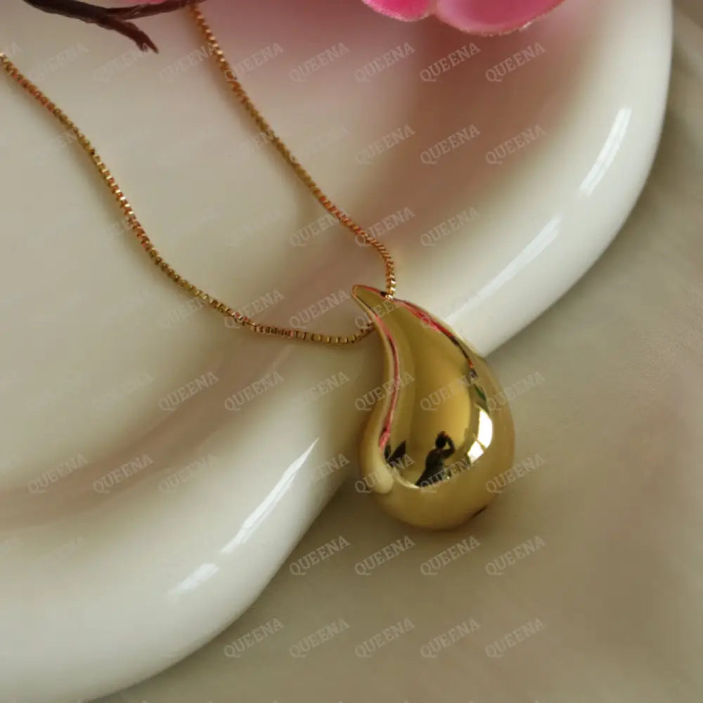 Trendy Reveka Golden Almond Pendent Necklace Necklaces