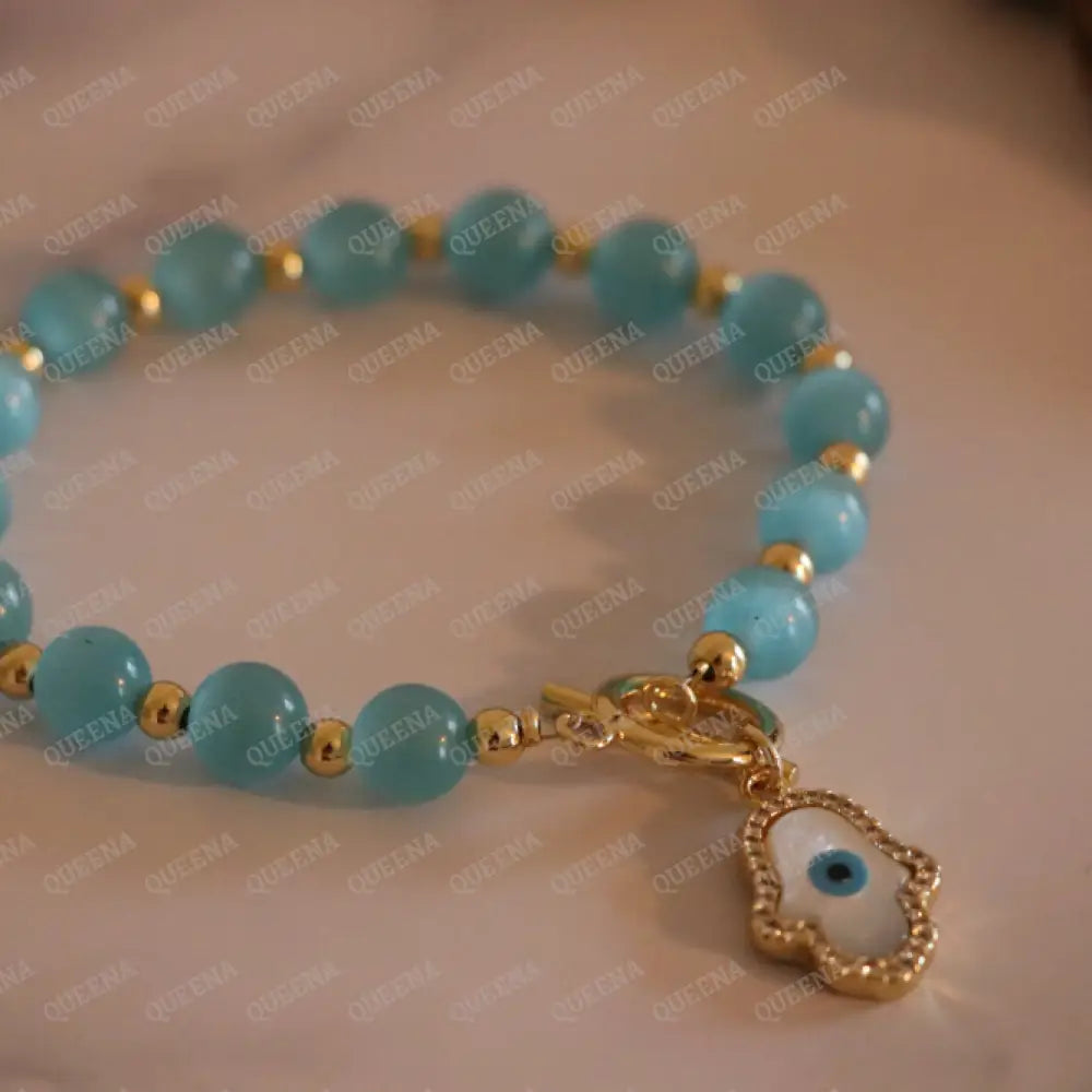 Turquoise Bluestones Beads Bracelet With Crystal Zircon Hamsa Hand Charm